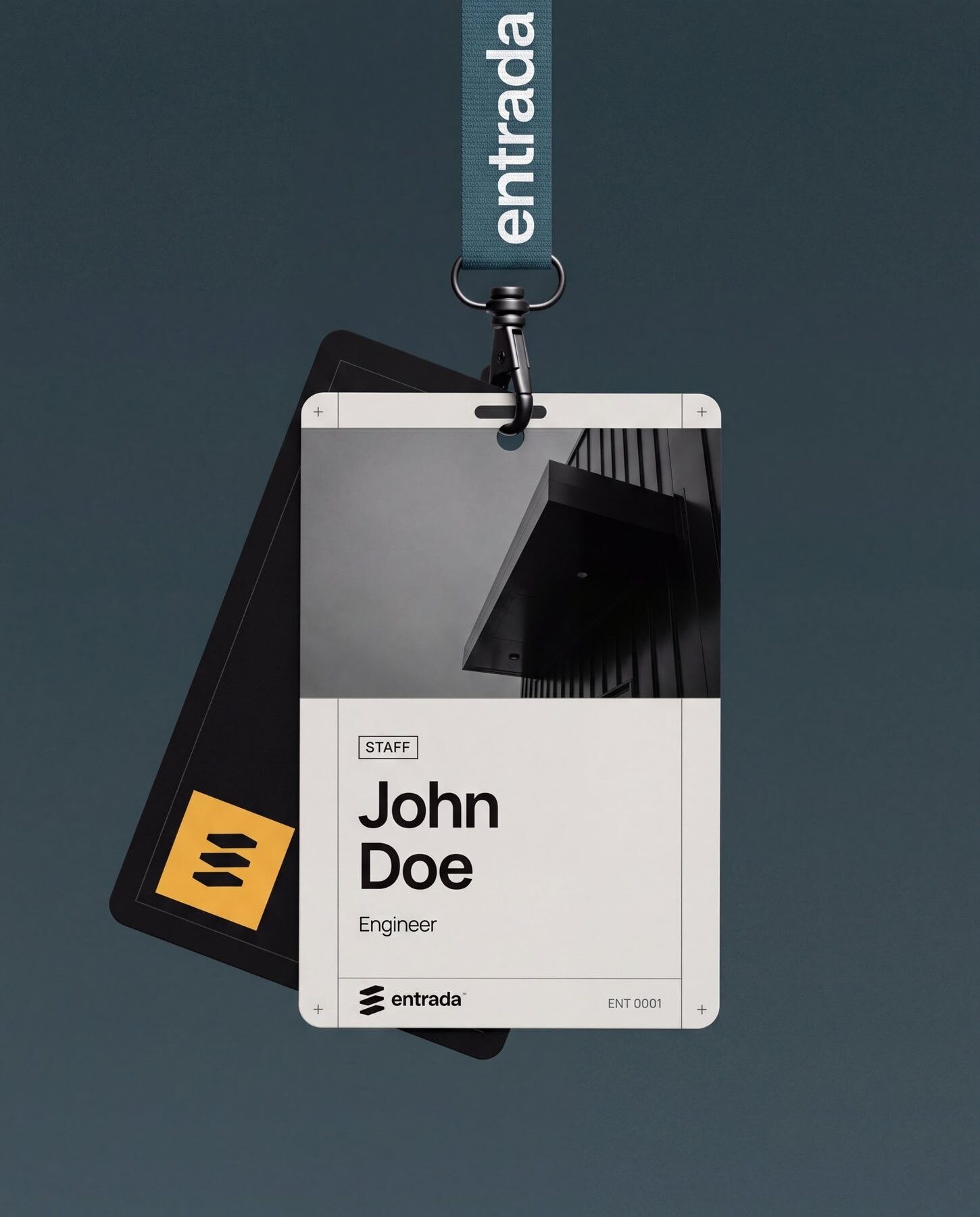 Entrada staff ID card on a lanyard printed with the wordmark